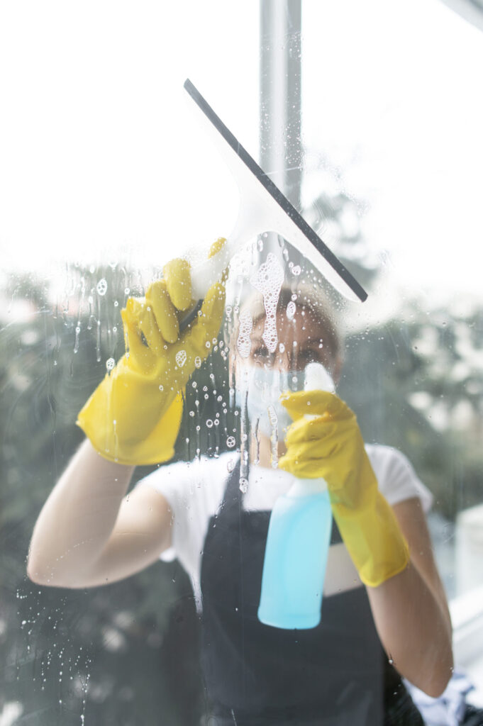 person-taking-care-office-cleaning-scaled.jpg